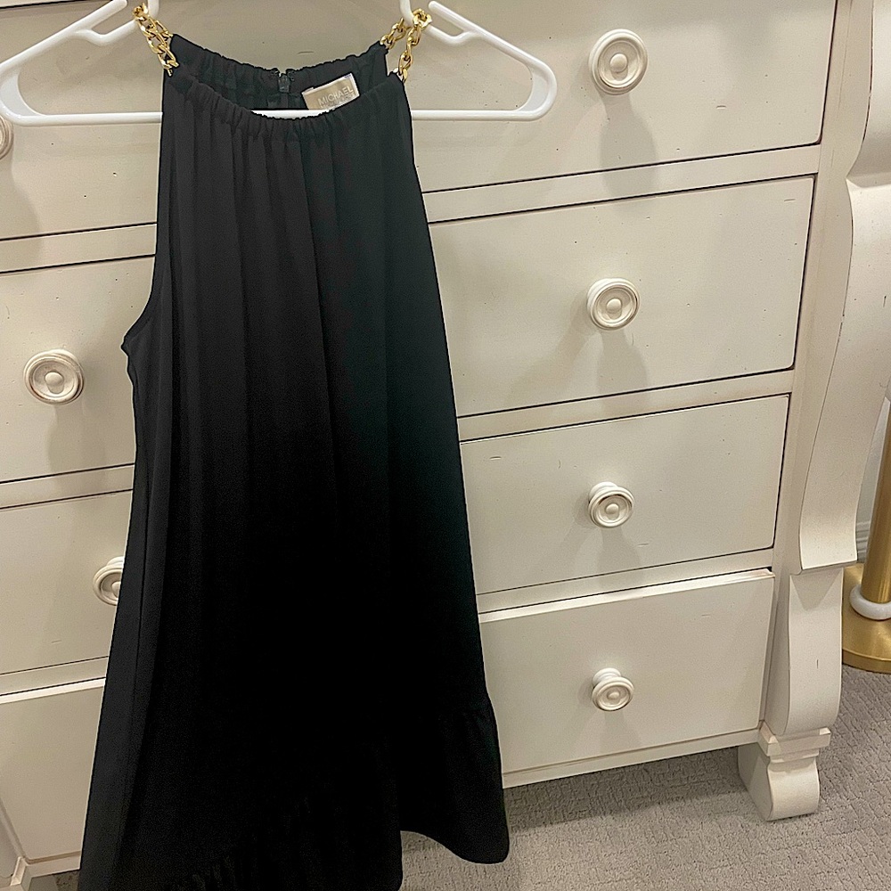 Michael Kors dress with gold chain strap detailing.